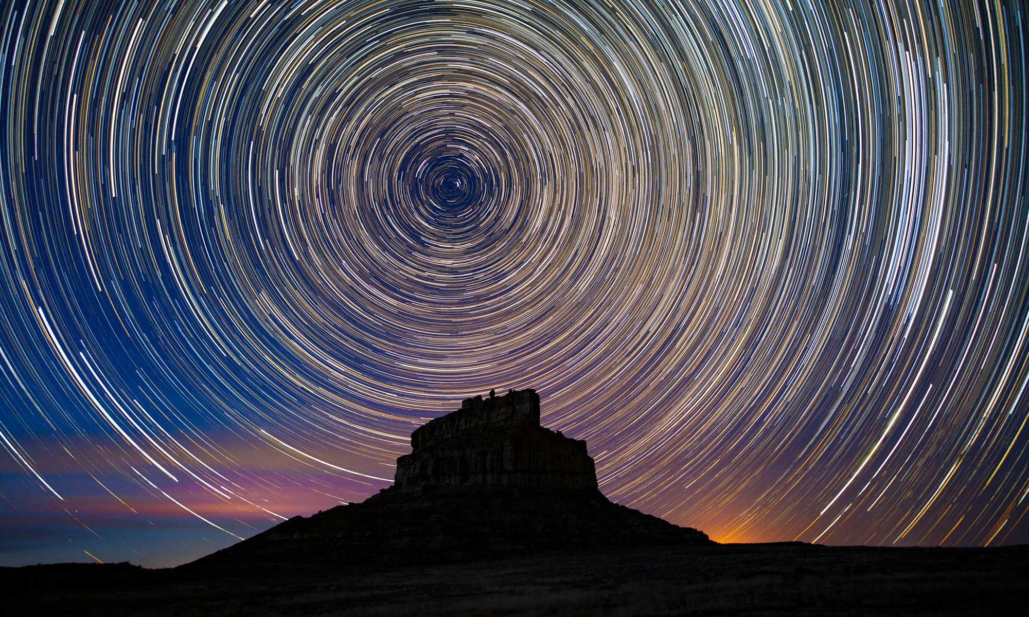 Time-lapse image of stars circling over Fajada Butte | NPS Photo by B. Davis