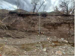 Heavily incised channel of Pack Creek from debris flows.