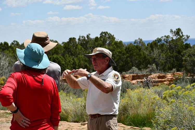 Dr. Chuck Carson, park volunteer and MVA Board member, shares insights with Park Visitors